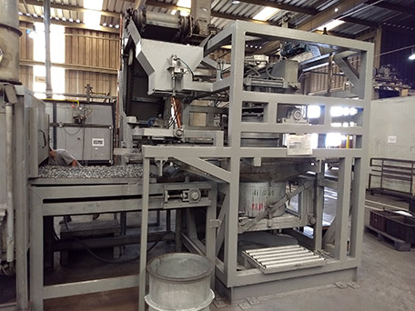 GCA centrifuge with elevating conveyor and hopper